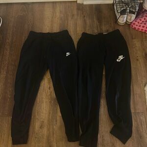 Two pairs of Nike Joggers !